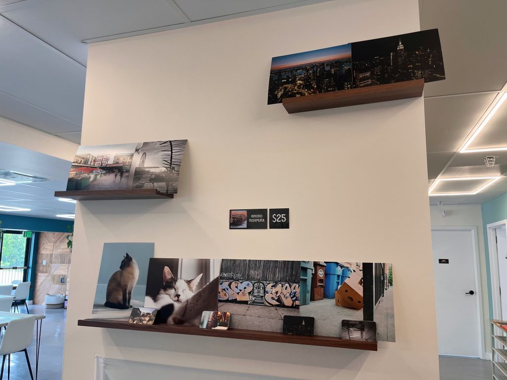 Photographs on a wall in a cafe
